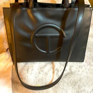 Like new large black Telfar bag.